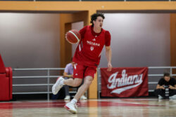 Conor Enright handles the ball.
