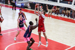 Reed Bailey finishes at the rim.