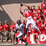 IU football defensive back Louis Moore intercepts a pass.