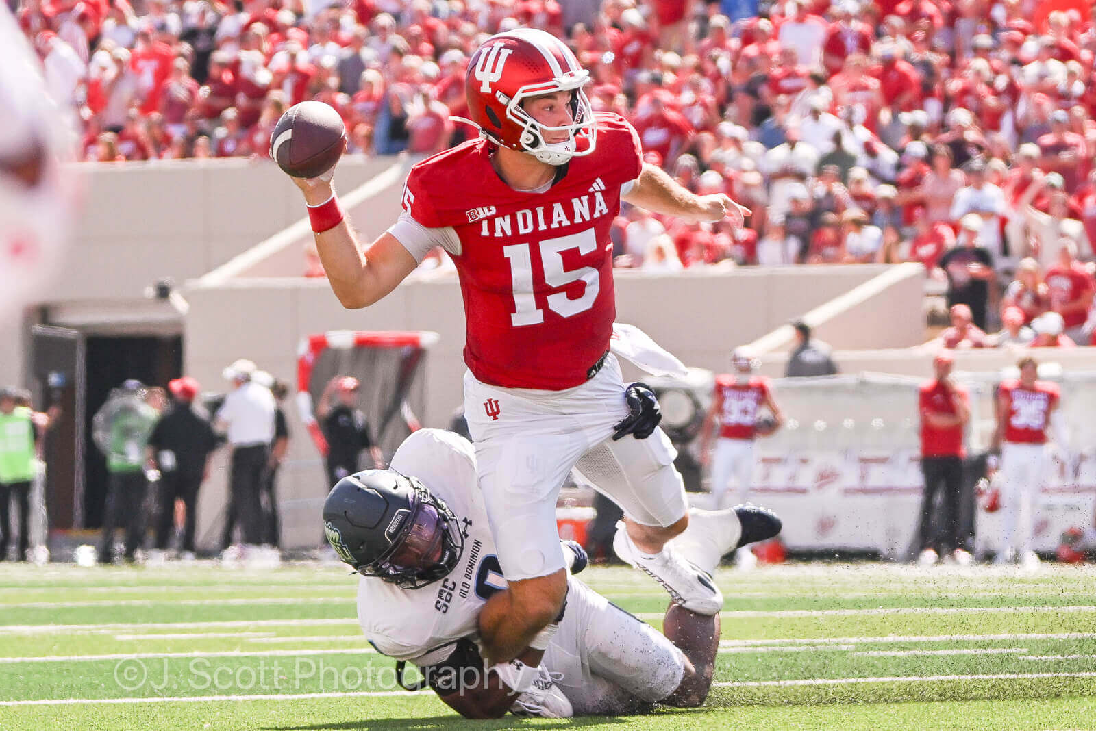 IU football quarterback Fernando Mendoza attempts a pass.