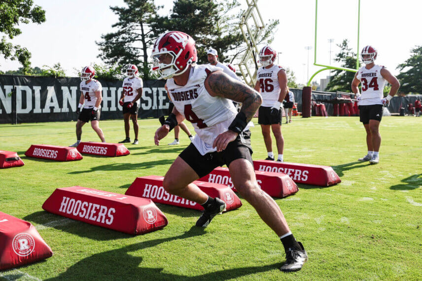 Indiana linebacker Aiden Fisher goes through drills at practice.