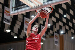 Trent Sisley dunks in an exhibition game in Puerto Rico.