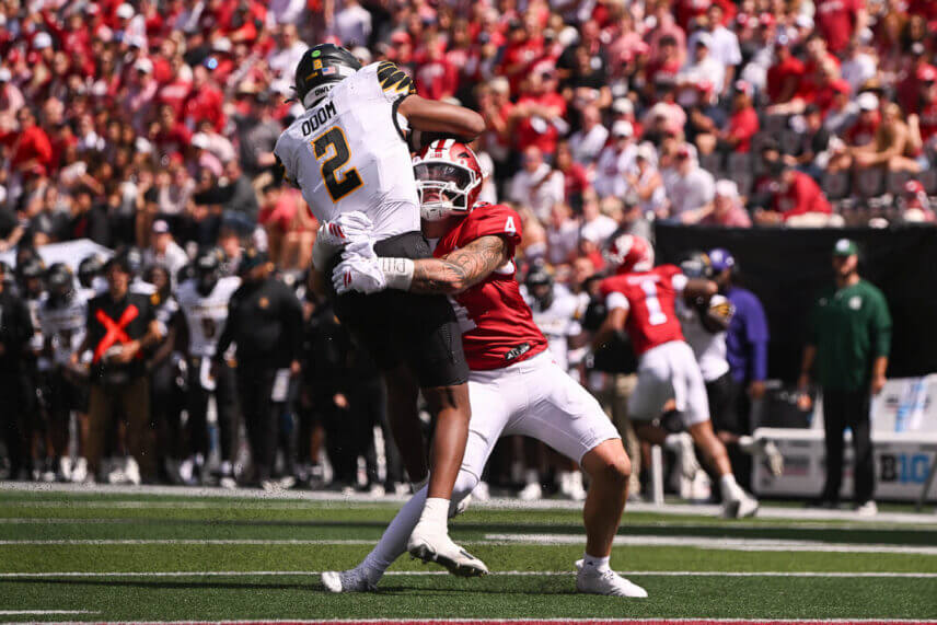 Aiden Fisher makes a tackle.