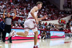 Trent Sisley celebrates a 3-point make by IU basketball.
