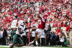 Elijah Sarratt catches a touchdown pass against Michigan State.