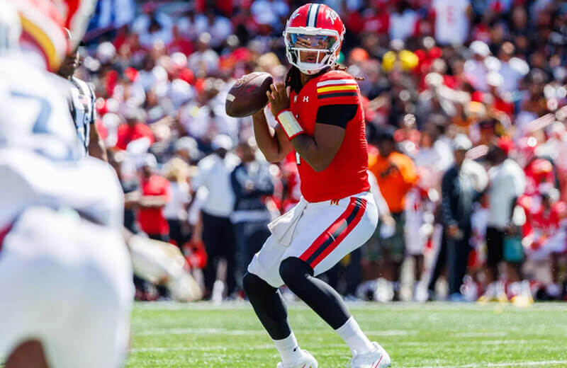 Maryland quarterback Malik Washington gets ready to throw a pass.