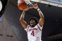 Sam Alexis dunks the ball.