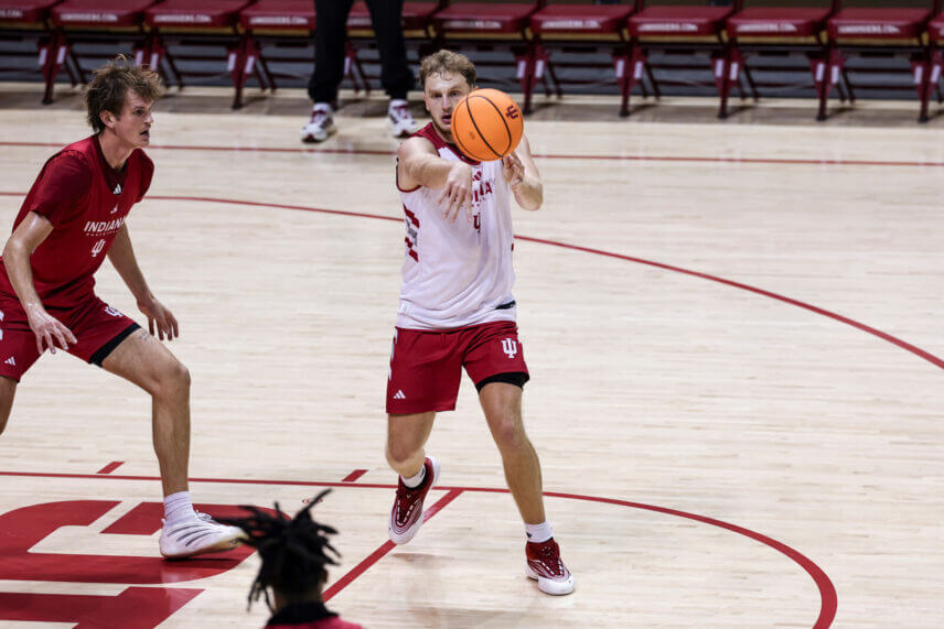 Tucker DeVries passes the ball in an open practice in Bloomington.