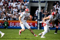 Fernando Mendoza rushes the ball.