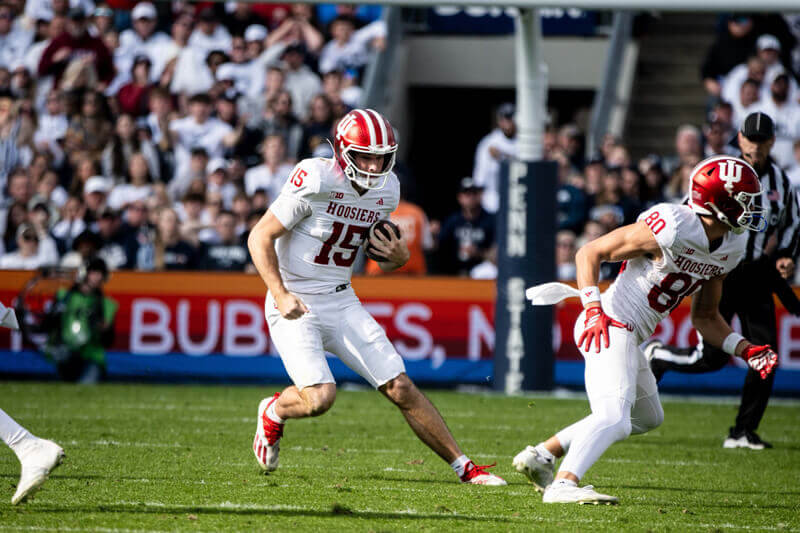 Fernando Mendoza rushes the ball.