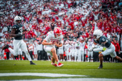 Fernando Mendoza rushes for a touchdown at Penn State.