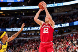 Tucker DeVries attempts a shot.