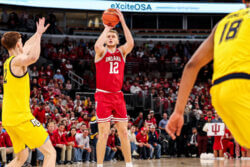 Tucker DeVries attempts a shot.