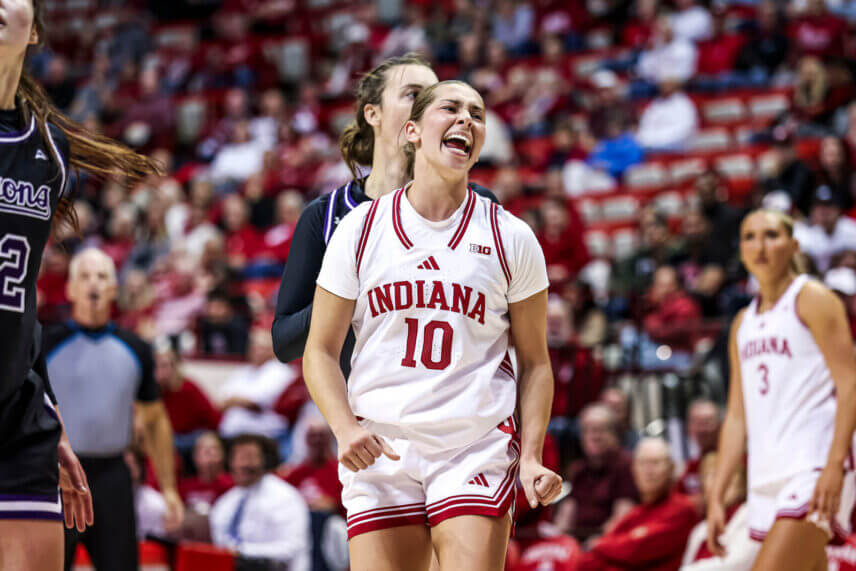 IU women's basketball guard Shay Ciezki celebrates a play.