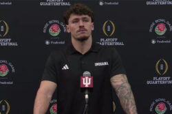 Aiden Fisher addresses the media.