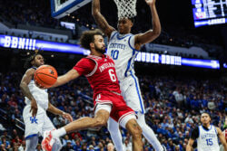 Tayton Conerway jumps in the air against Kentucky.