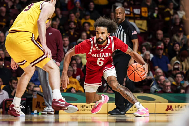 Tayton Conerway handles the ball at Minnesota.
