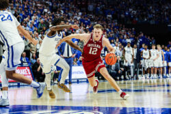 Tucker DeVries drives the ball against Kentucky.