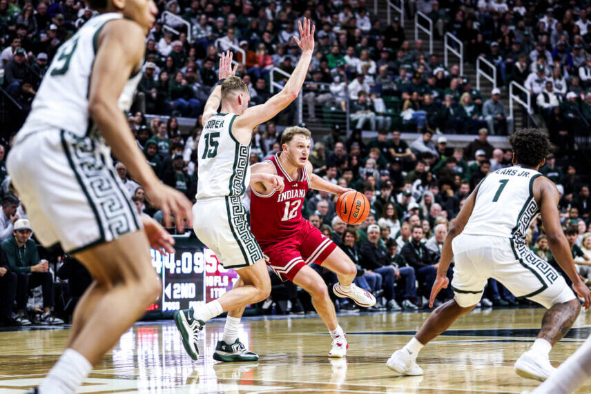 Tucker DeVries handles the ball against Michigan State.