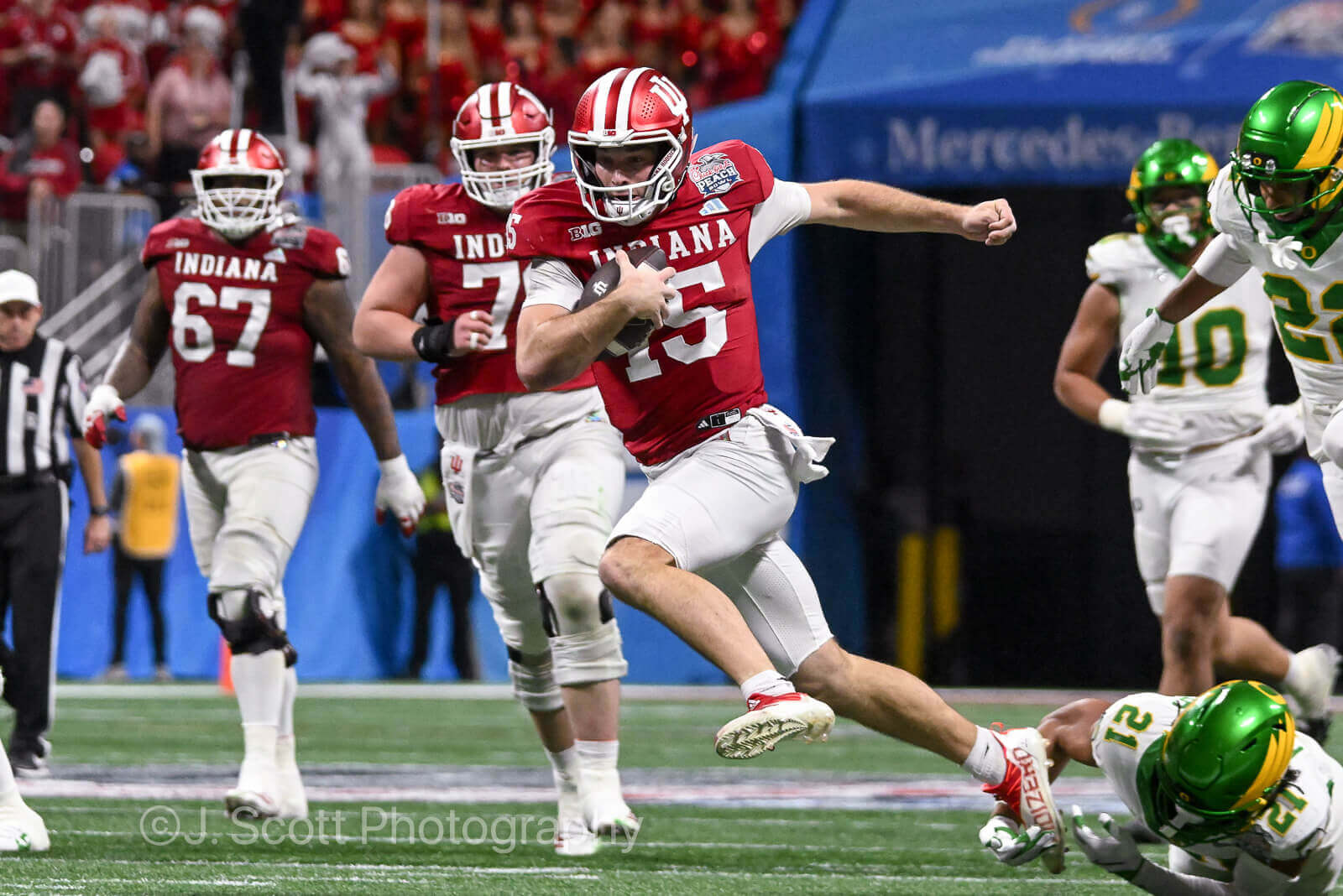 ATLANTA – Check out 81 photos by Jamie Owens from Indiana's 56-22 win against Oregon in the CFP semifinal at the Chick-fil-A Peach Bowl at Mercedes-Benz Stadium.