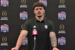 Aiden Fisher addresses the media.