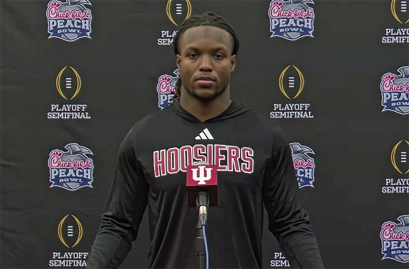 Roman Hemby addresses the media.