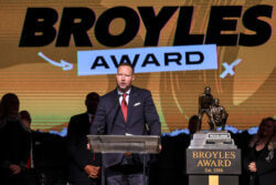 Bryant Haines accepts the Broyles Award.