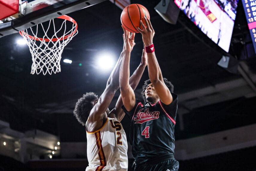 Sam Alexis goes for a rebound at USC.