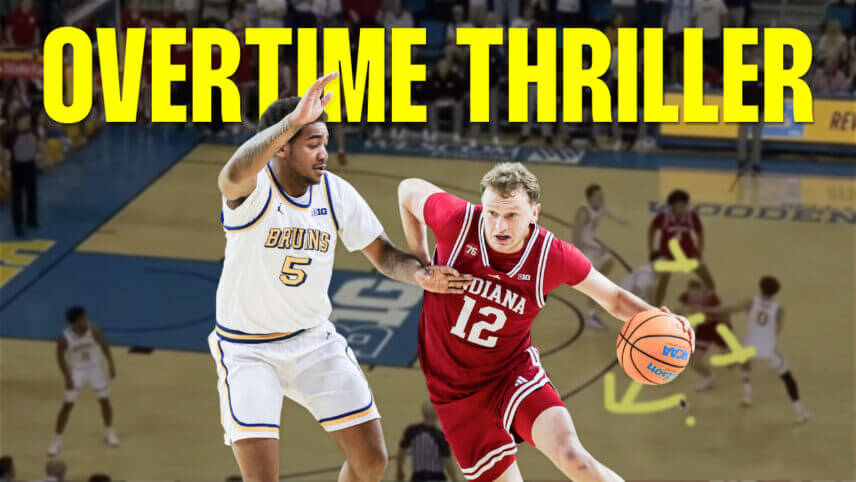 Tucker DeVries drives the basketball.