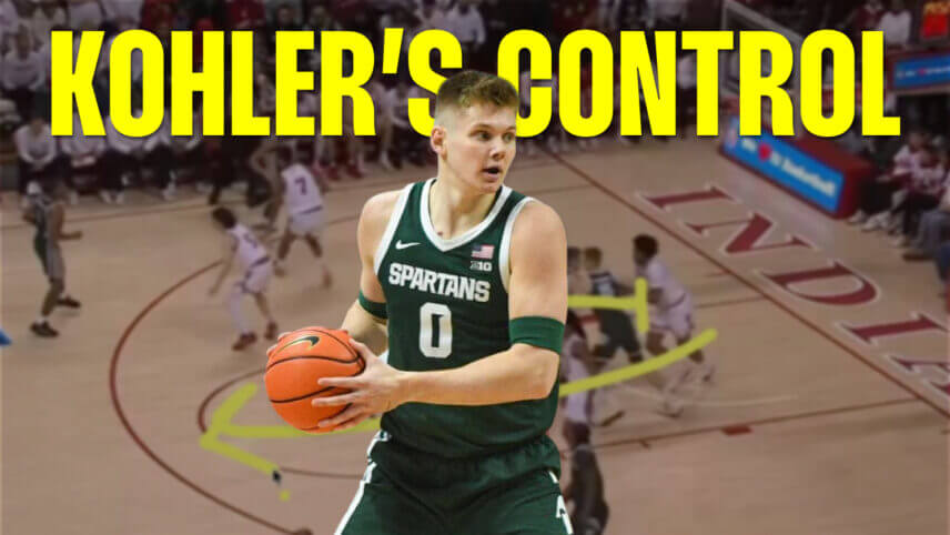 Jaxon Kohler holds a basketball.