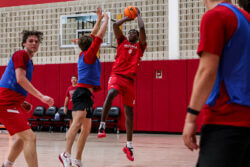 Aiden Sherrell attempts a shot at IU basketball practice.