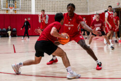 Aiden Sherrell guards the perimeter at an IU basketball practice.