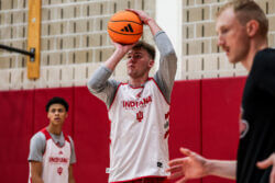 Trent Sisley attempts a shot at IU basketball practice.