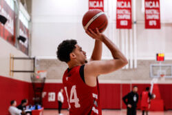 Darren Harris attempts a perimeter shot at IU basketball practice.