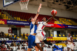 Prince-Alexander Moody drives to the basket.