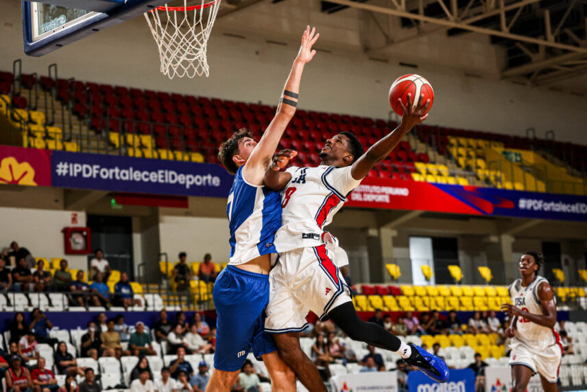 Prince-Alexander Moody drives to the basket.