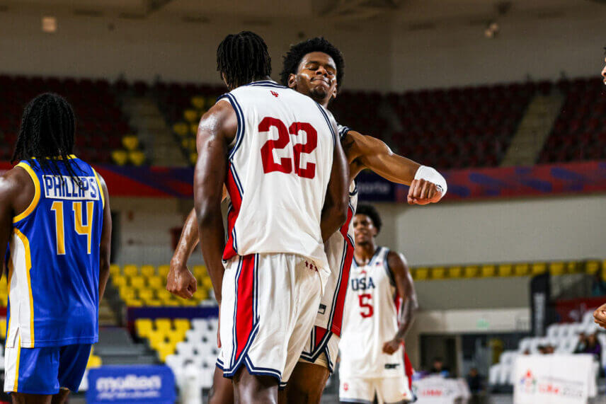 Jaeden Mustaf and Aiden Sherrell celebrate a play in the FISU America Games.