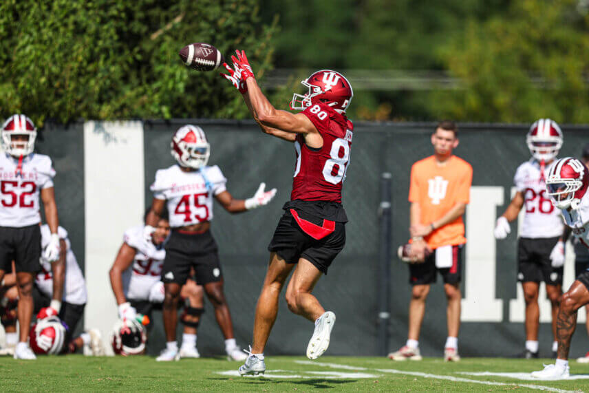Charlie Becker catches a pass at IU football practice.