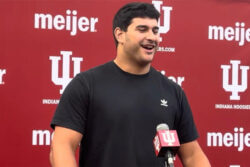 Mario Landino addresses the media.