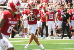 Josh Hoover drops back for a pass.