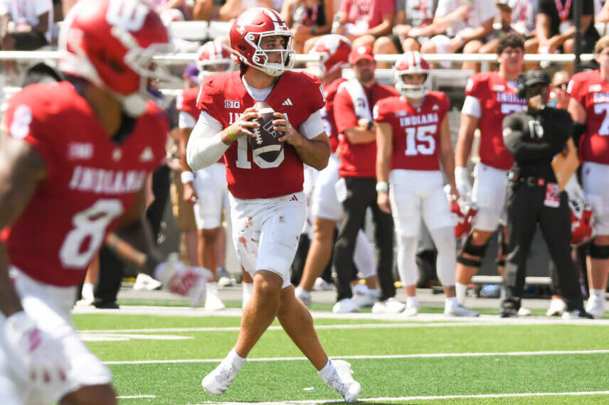 Josh Hoover drops back for a pass.