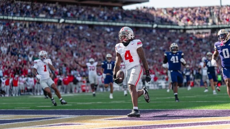 Jeremiah Smith scores a touchdown at Washington.